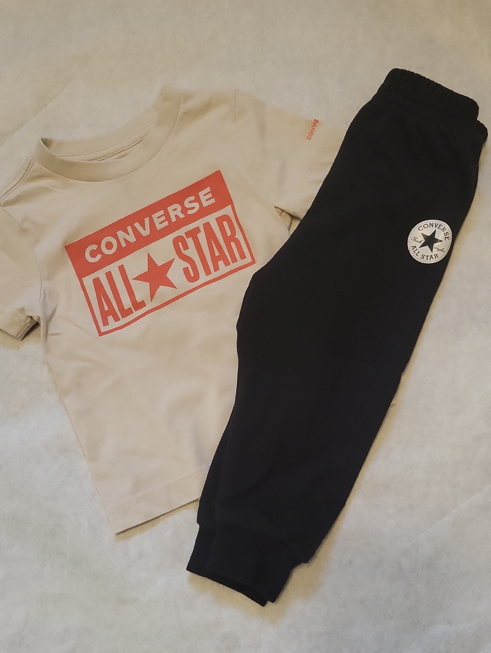 Converse cream tee shirt and black joggers